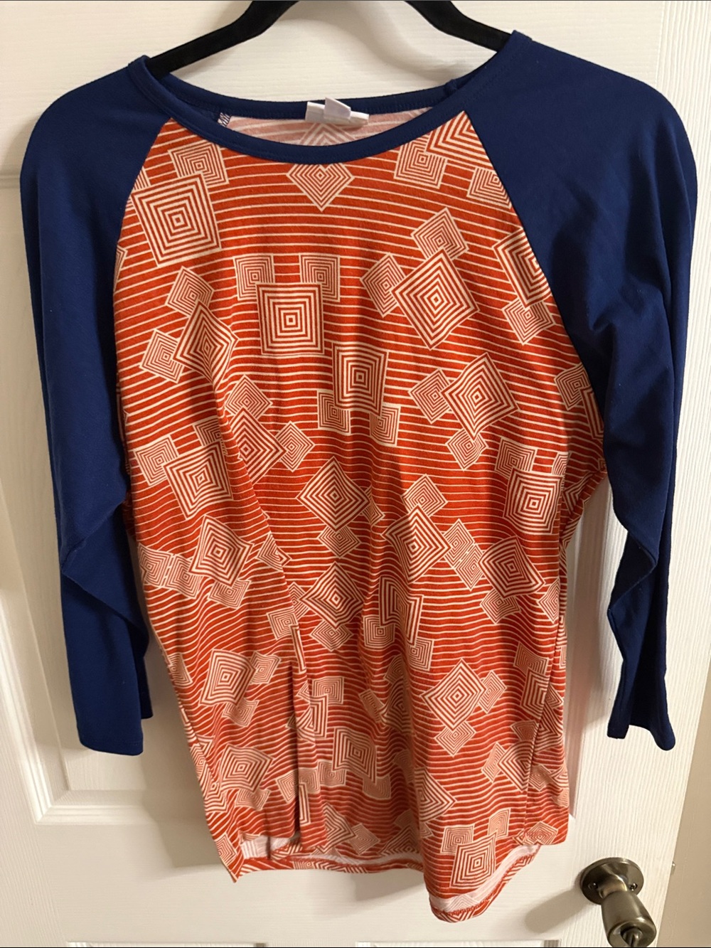 LuLaRoe Orange Geometric Raglan Top with Navy Sleeves
